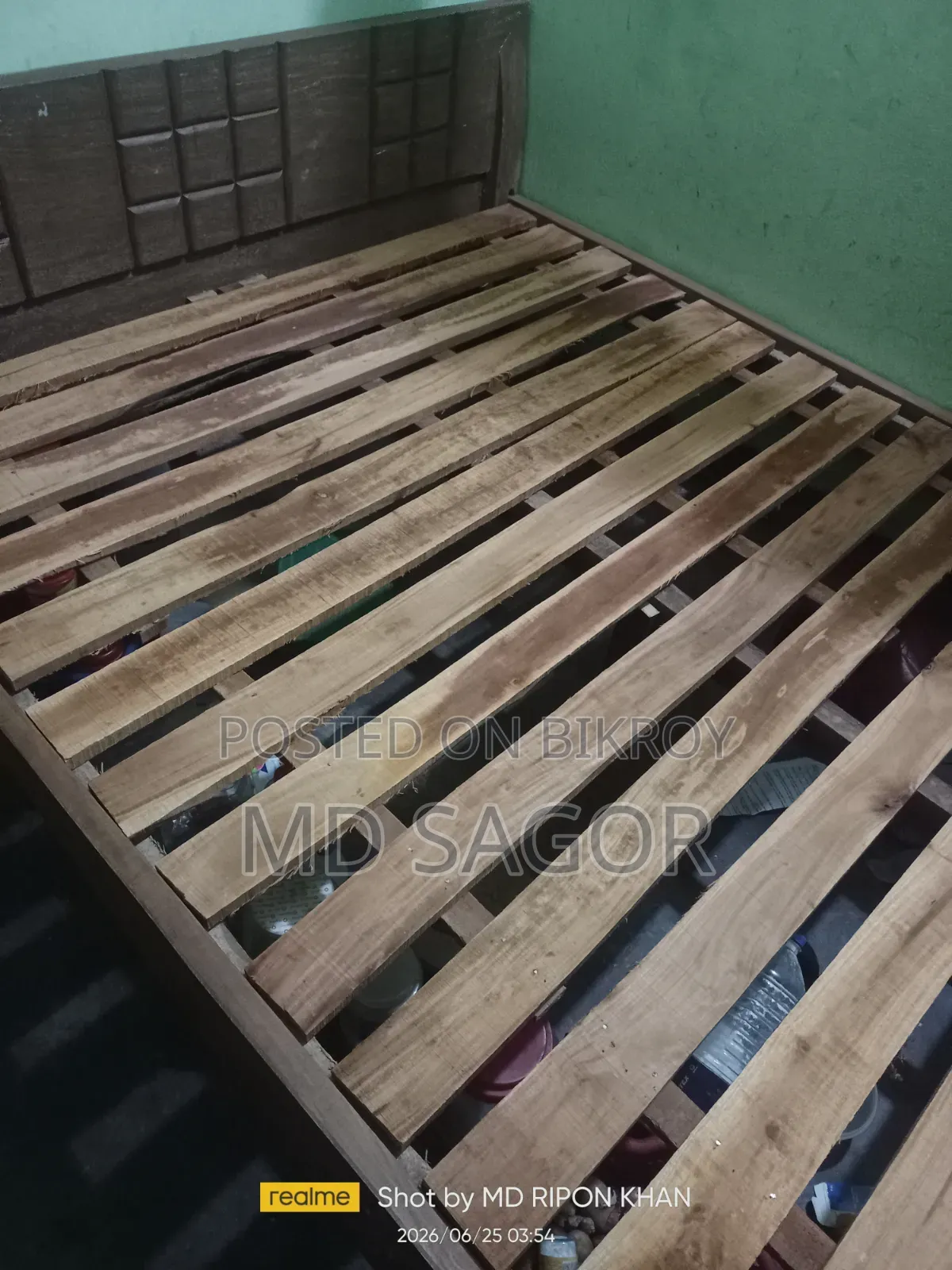 A bed and mattress for sale
