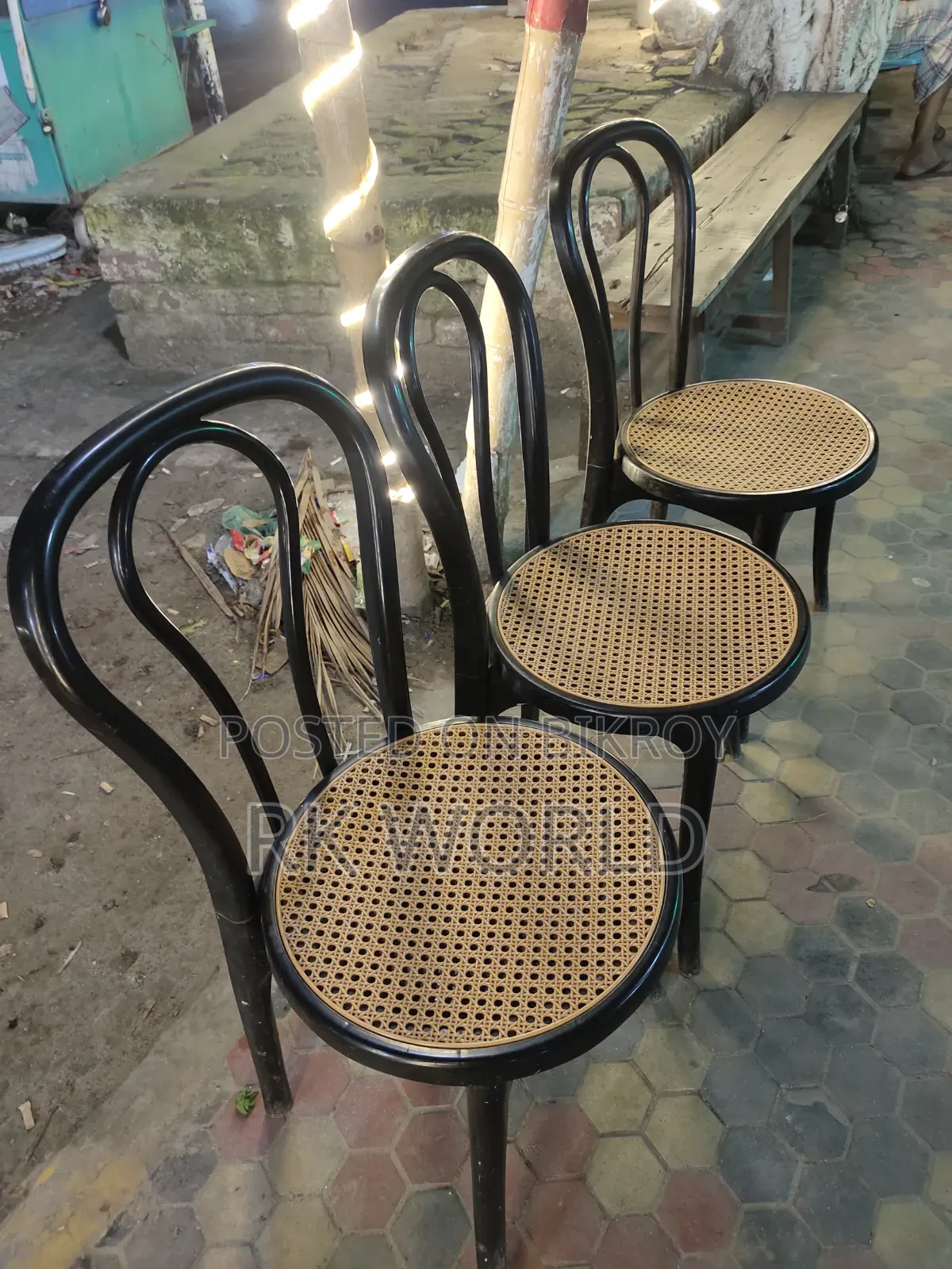 Office table, 3 cane chairs, and revolving chair for sale