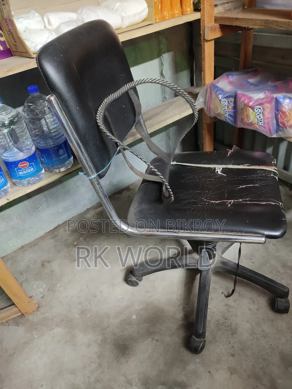 Office table, 3 cane chairs, and revolving chair for sale