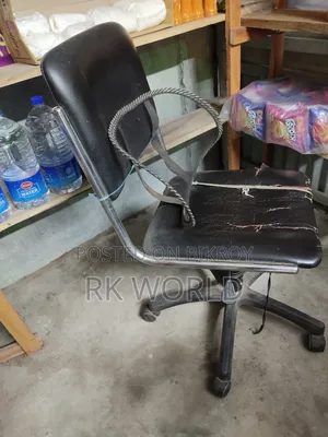 Office table, 3 cane chairs, and revolving chair for sale