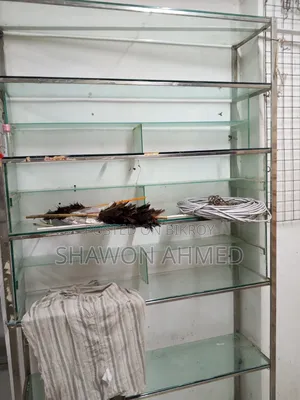 Stainless steel and glass racks for sale for showroom/pharmacy/cosmetics shop