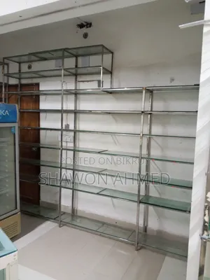 Stainless steel and glass racks for sale for showroom/pharmacy/cosmetics shop