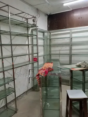 Stainless steel and glass racks for sale for showroom/pharmacy/cosmetics shop