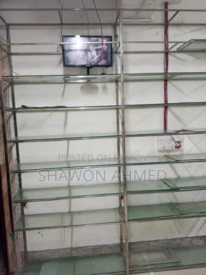 Stainless steel and glass racks for sale for showroom/pharmacy/cosmetics shop