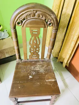 2 Teak wood chairs