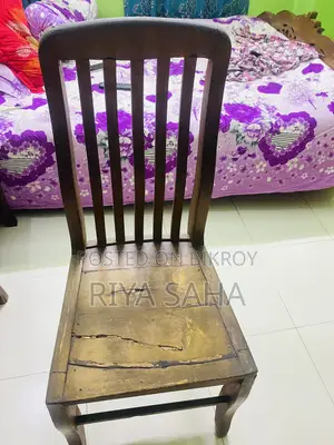 2 Teak wood chairs