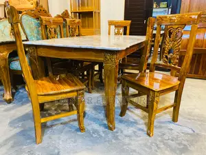 ছয়টি চেয়ারসহ ডাইনিং টেবিল