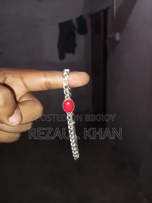 Silver bracelet with 1 bhori 9 ana plus stones.