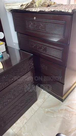 A dressing table and a wardrobe will be sold.