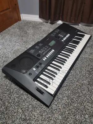 Yamaha PSR E-423 (with bag and stand) Touch-Sensitive Keyboard