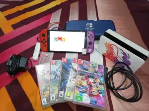 Nintendo Switch OLED (Scarlet And Violet Limited Edition) + 6 Games