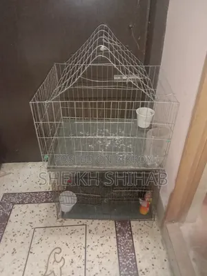 2 chicken cages with trays for sale.