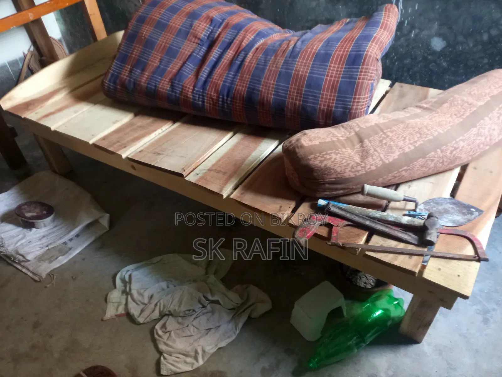 A wooden single bed/cot will be sold.