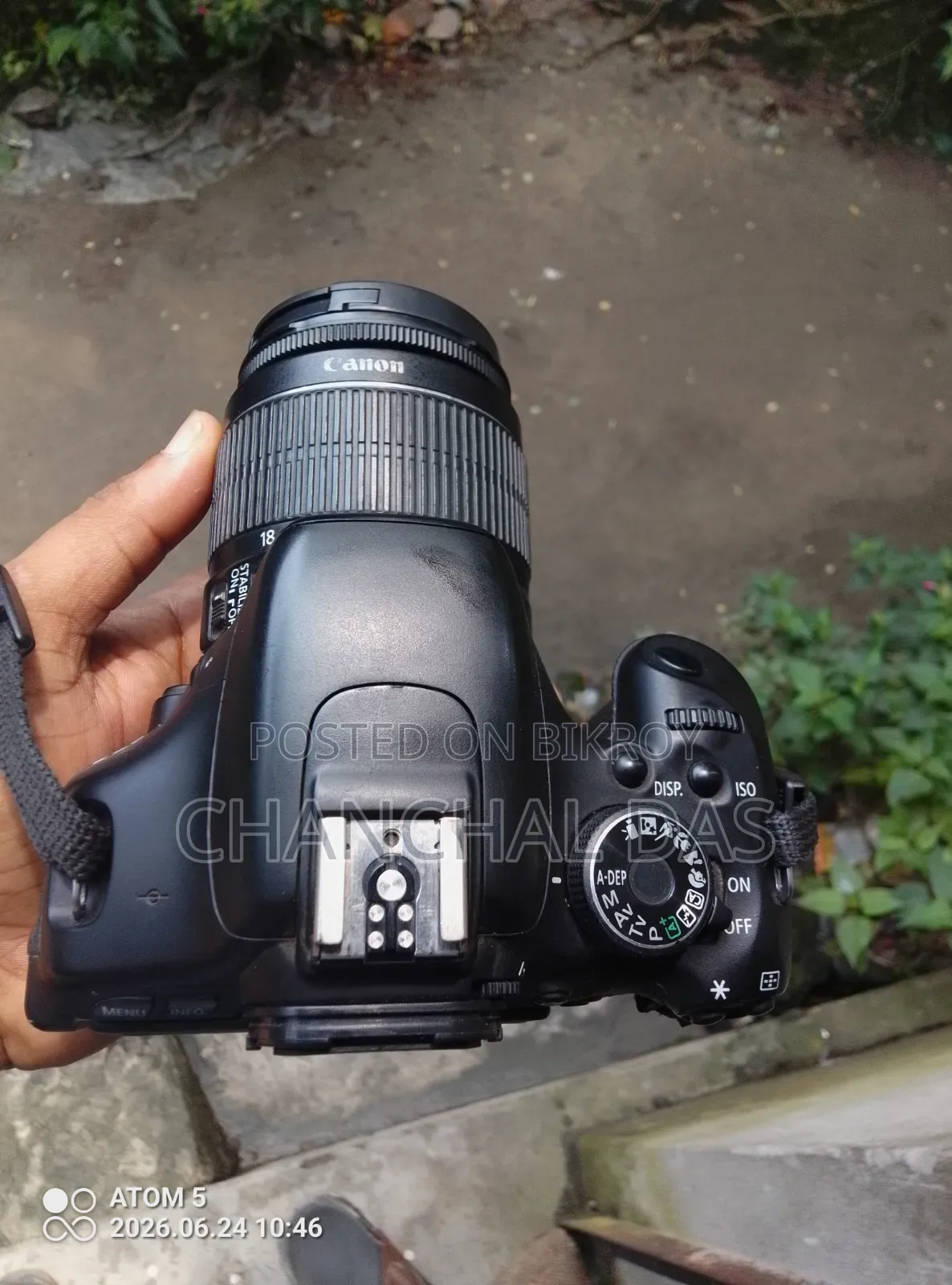 A fresh camera with three batteries, charger, and memory card included