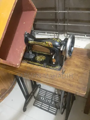 Singer Sewing Machine With Table