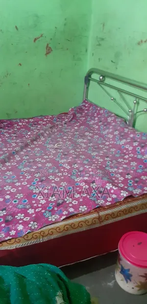Bed for sale, 6/7 size, one side needs welding