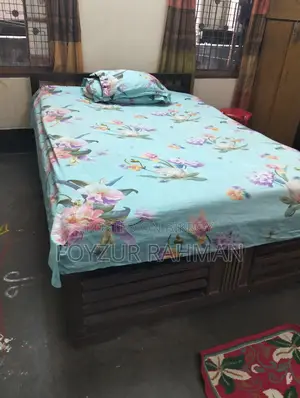 Bed and 2 mattresses and 1 quilt to be sold for a low price !!
