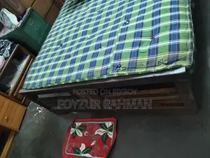 Bed and 2 mattresses and 1 quilt to be sold for a low price !!