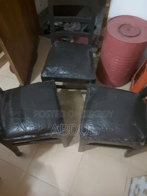 Three Wooden Cushioned Chairs