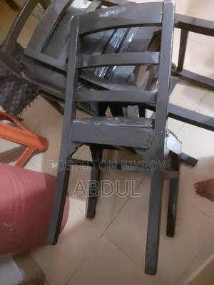 Three Wooden Cushioned Chairs