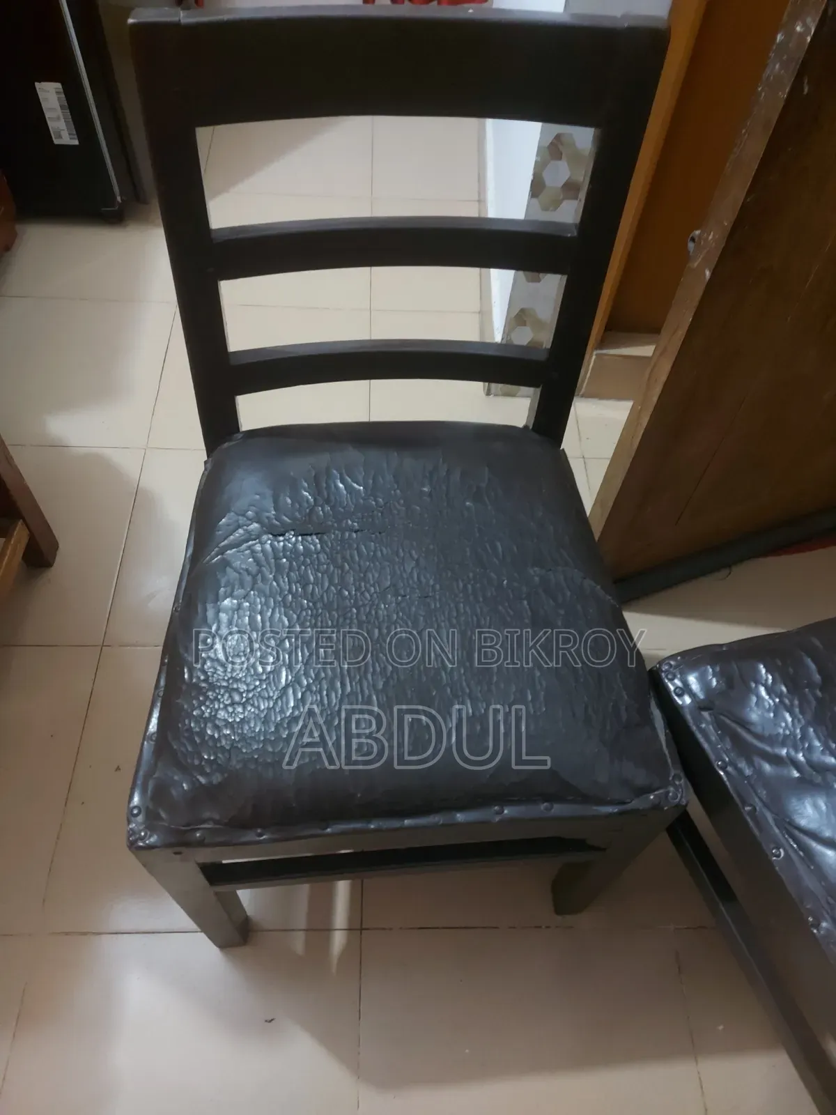 Three Wooden Cushioned Chairs
