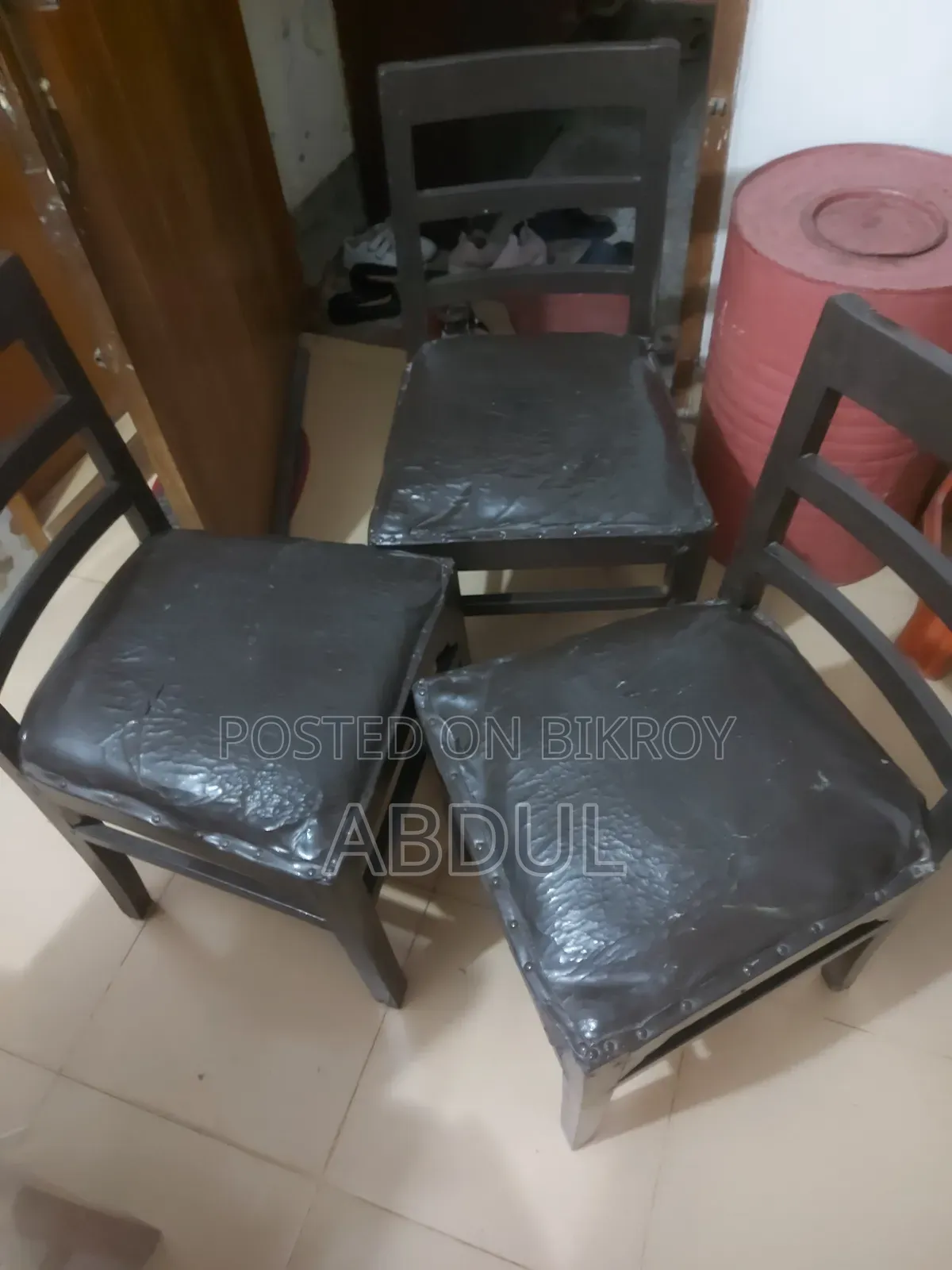 Three Wooden Cushioned Chairs