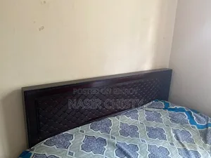 A beautiful black colored bed for sale. Very beautiful to look at.