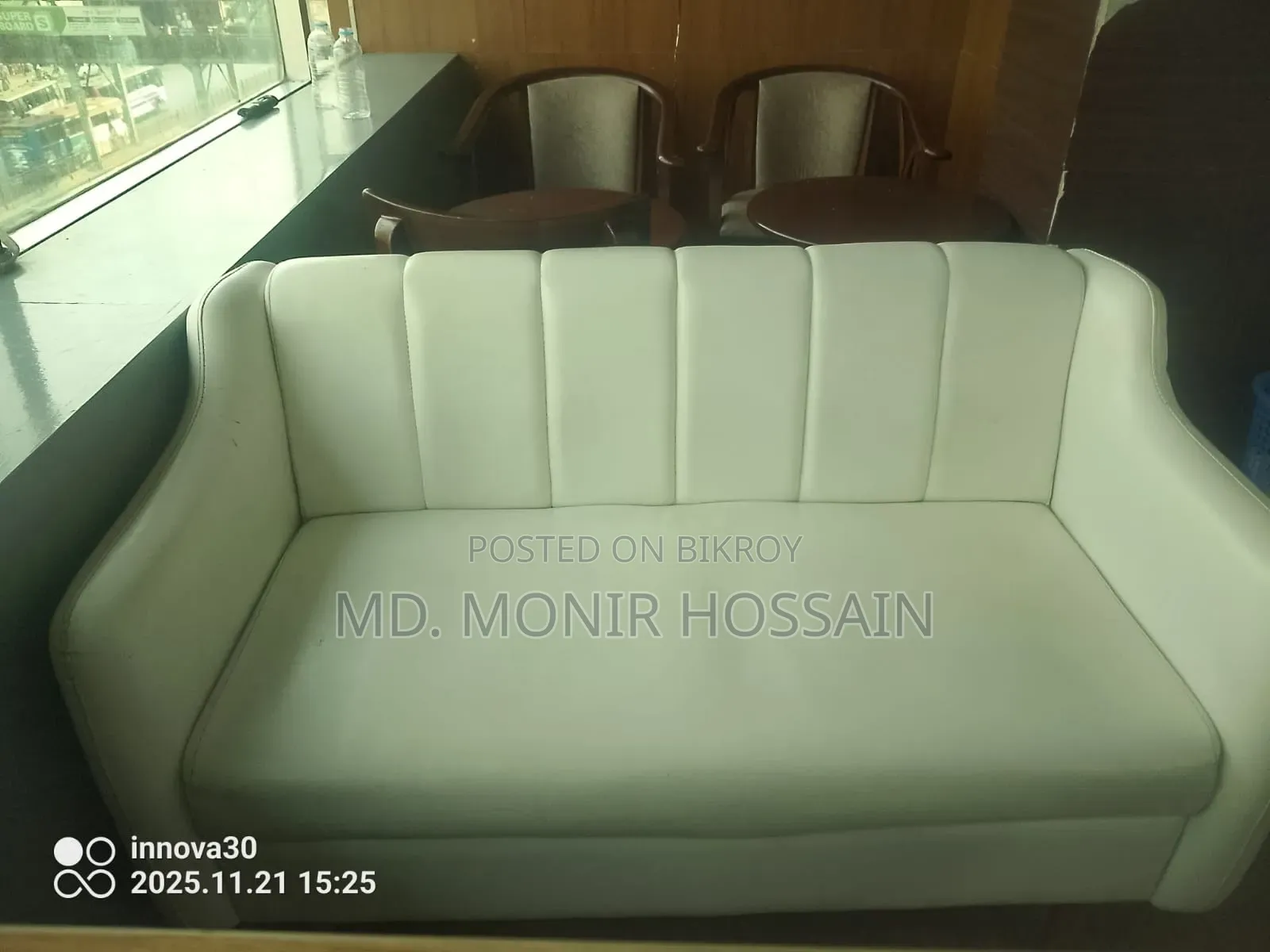 A pair of sofas and a table