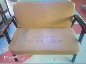 A pair of sofas and a table