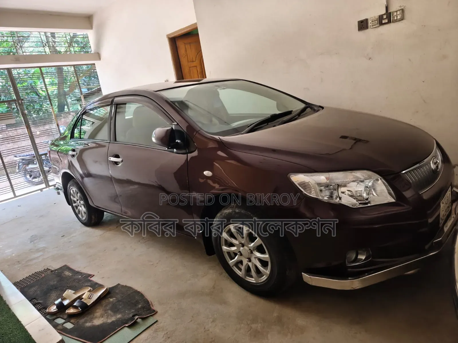 টয়োটা এক্সিও ২০০৯ লাল