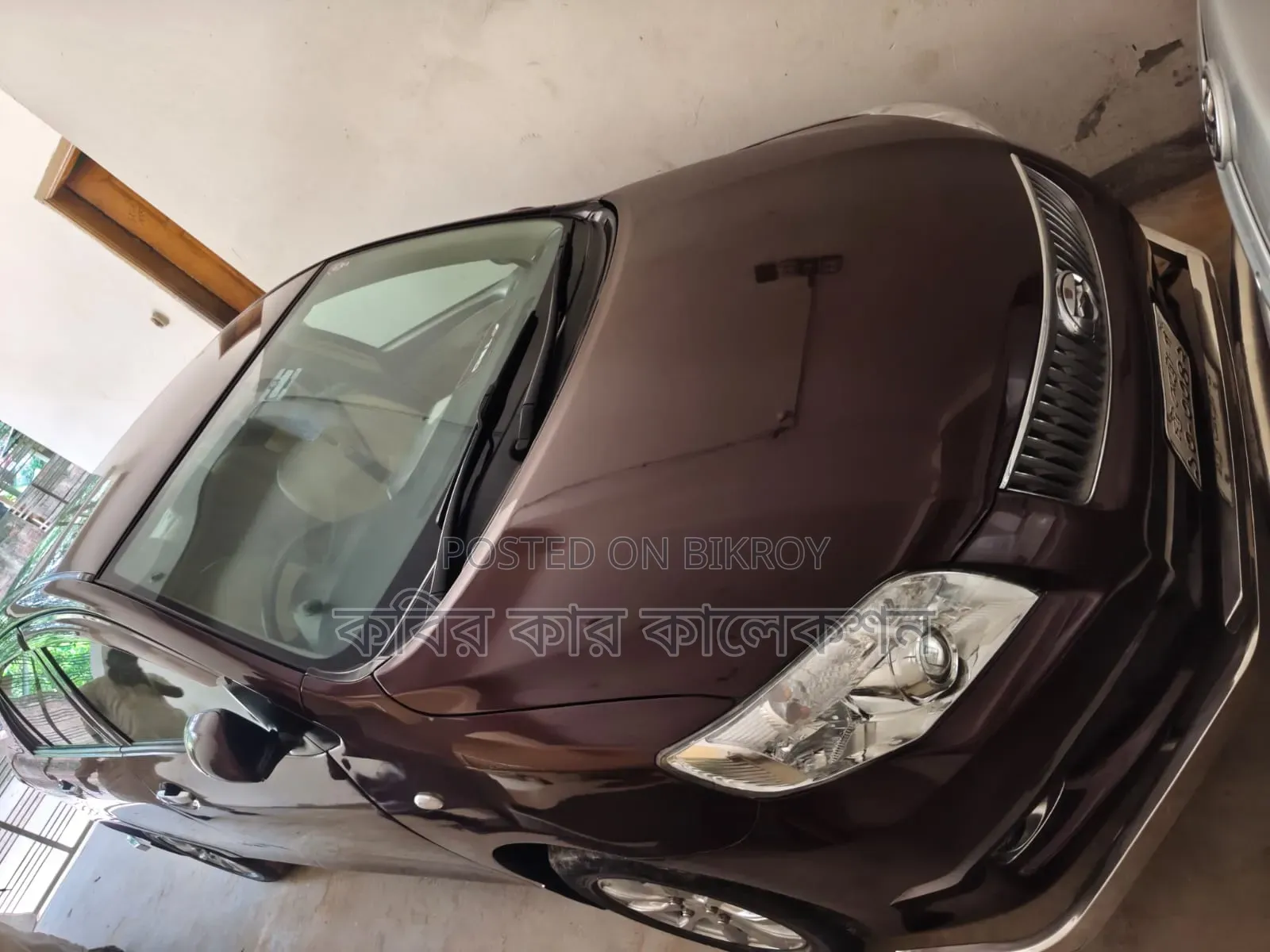 টয়োটা এক্সিও ২০০৯ লাল