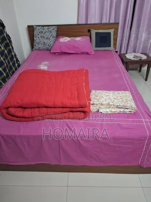 Bed (7 feet by 5 feet) and mattress for sale