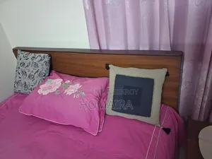 Bed (7 feet by 5 feet) and mattress for sale