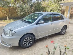 টয়োটা করোলা সেডান ২০০৪ সিলভার