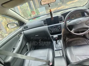 টয়োটা করোলা সেডান ২০০৪ সিলভার