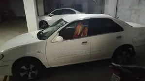 নিসান ব্লুবার্ড ২০০৫ সাদা
