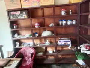 মুদি দোকানের তাক সেগুন কাঠ দিয়ে বানানো