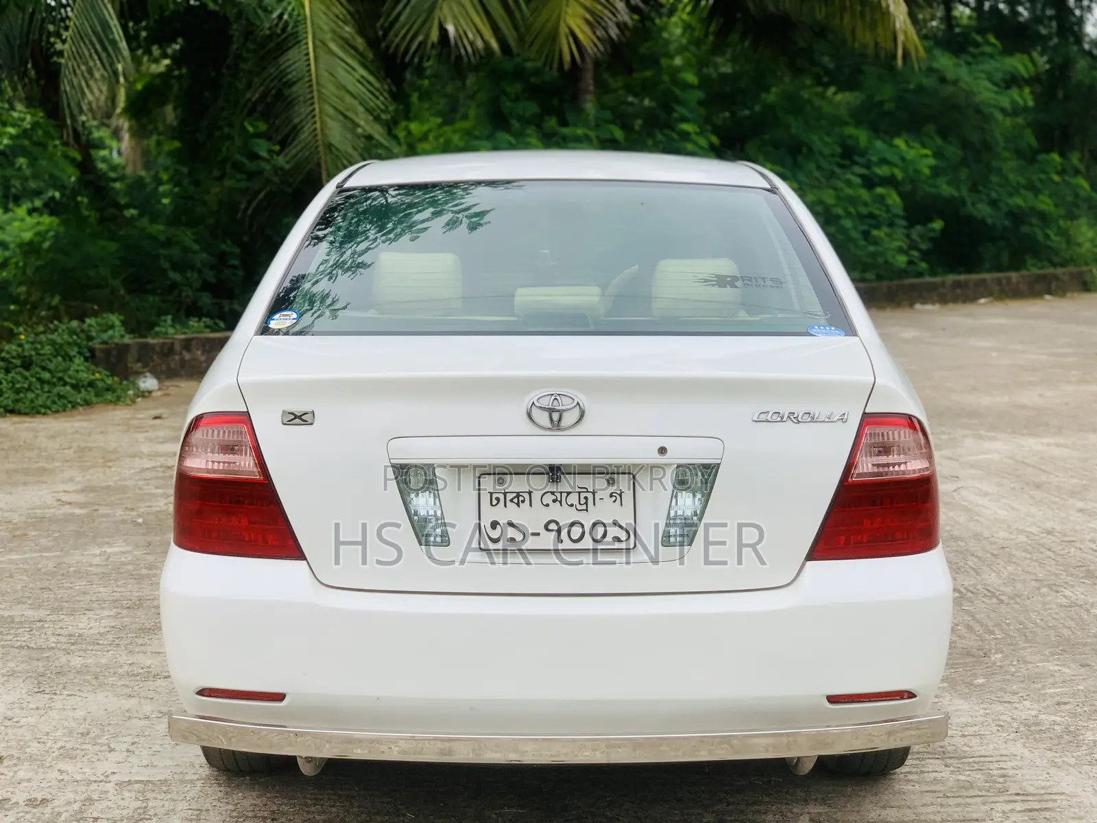 টয়োটা করোলা সেডান ২০০৫ সাদা