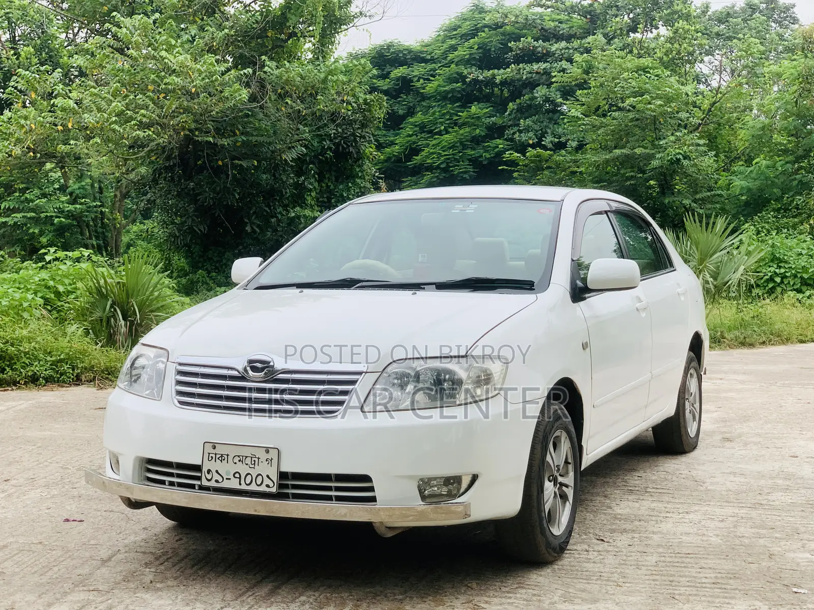 টয়োটা করোলা সেডান ২০০৫ সাদা