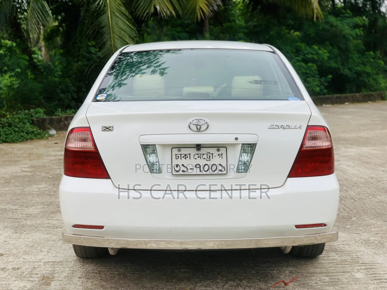 টয়োটা করোলা সেডান ২০০৫ সাদা