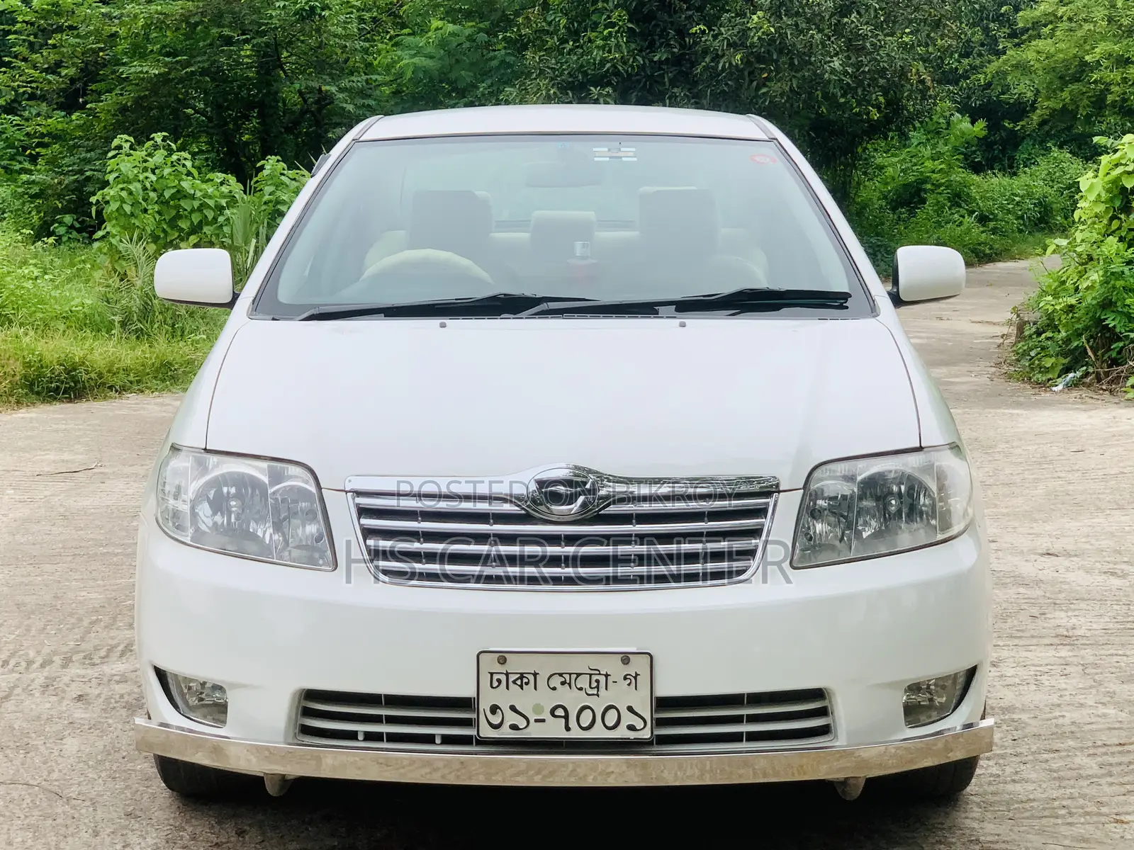 টয়োটা করোলা সেডান ২০০৫ সাদা