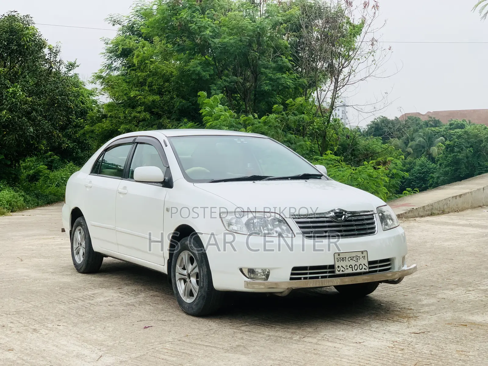 টয়োটা করোলা সেডান ২০০৫ সাদা
