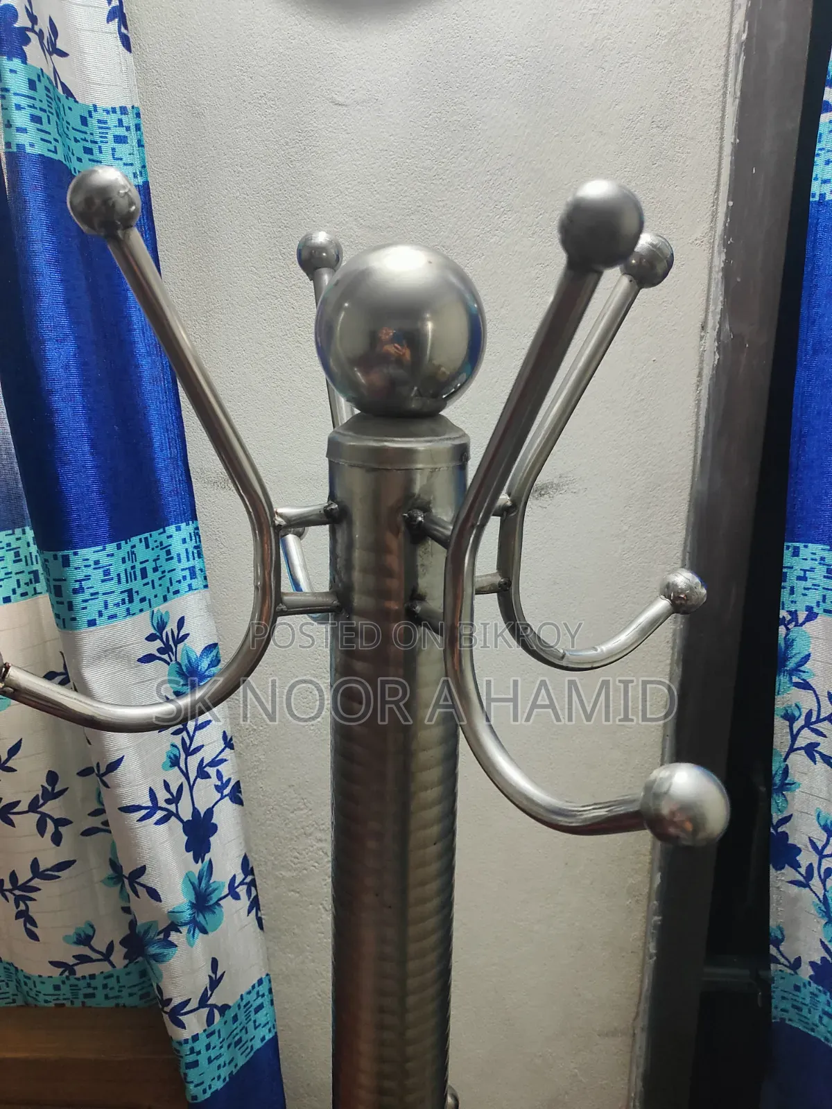 কাপড় ঝোলানোর হ্যাঙ্গার