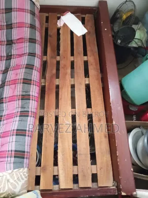 A bed and a wardrobe are for sale together
