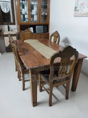 সেগুন কাঠের ৬টি চেয়ারসহ ডাইনিং টেবিল