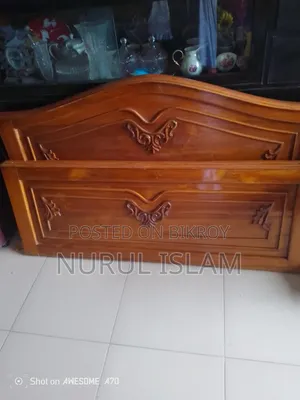 Semi-double teak wood bed for sale