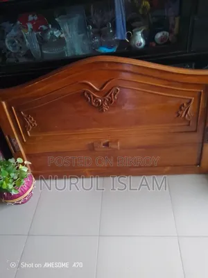 Semi-double teak wood bed for sale