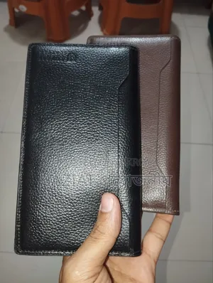 Long-wallet, holds two Android phones. Cash and 8+ card slots