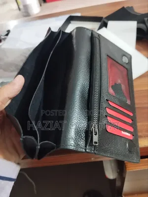 Long-wallet, holds two Android phones. Cash and 8+ card slots