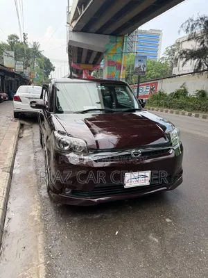 Toyota Corolla Rumion 2012 Brown